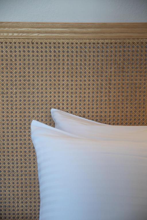 Postel nebo postele na pokoji v ubytování Acropolis Hotel