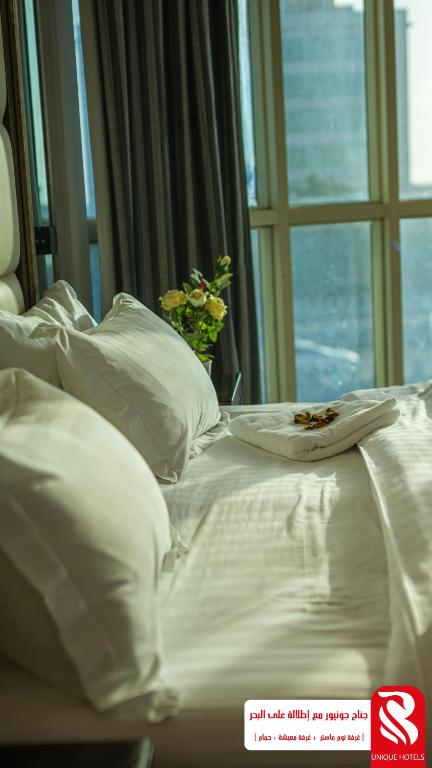 Postel nebo postele na pokoji v ubytování Al Andalus Tolen Hotel