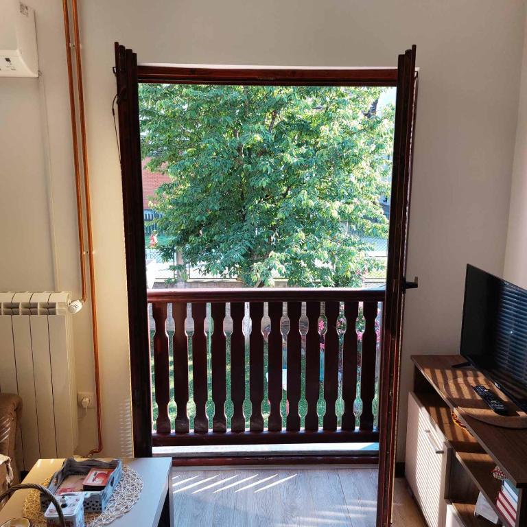 TV a/nebo společenská místnost v ubytování Apartman Vukan