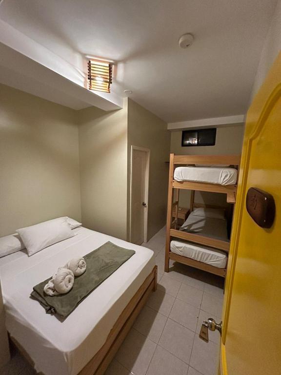 Postel nebo postele na pokoji v ubytování Chescos Hotel