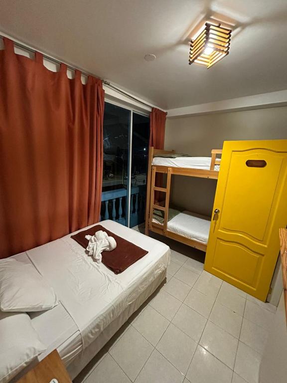 Postel nebo postele na pokoji v ubytování Chescos Hotel