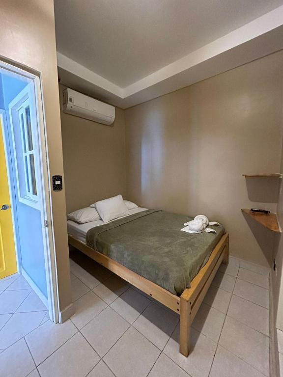 Postel nebo postele na pokoji v ubytování Chescos Hotel