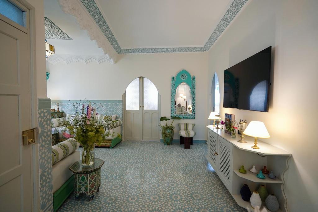 a large room with a hallway with a room with at Dar Badr in Tangier