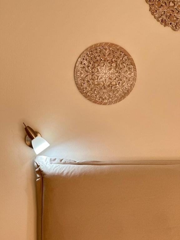 A bed or beds in a room at Venus Rooms