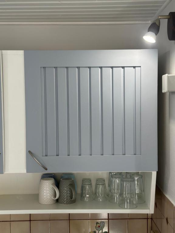 A kitchen or kitchenette at Venus Rooms