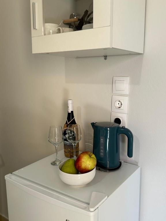 A kitchen or kitchenette at Venus Rooms