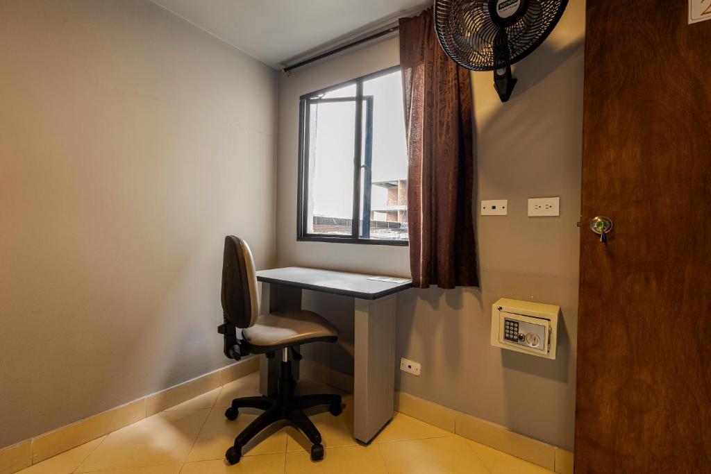TV a/nebo společenská místnost v ubytování Poblado Guest House