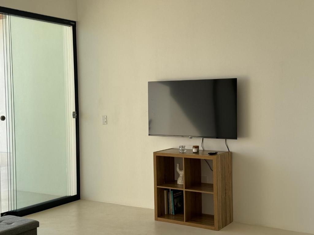 TV a/nebo společenská místnost v ubytování Les Roches - Paradise Retreat