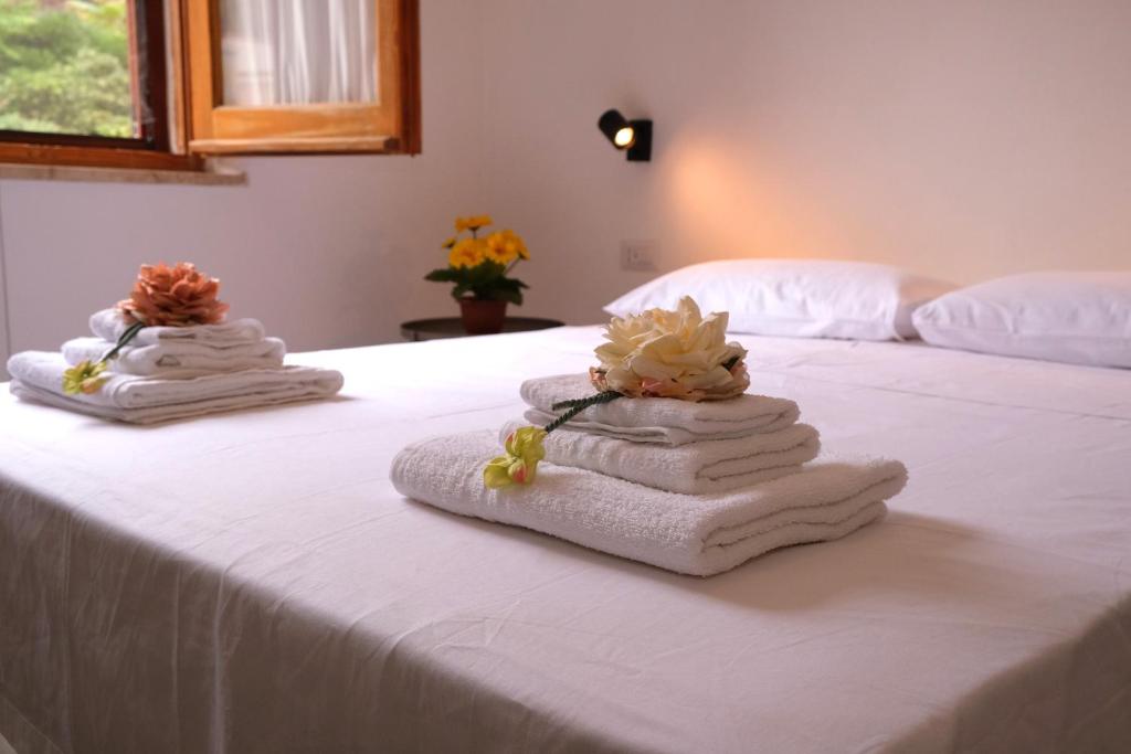 Postel nebo postele na pokoji v ubytování Sunset Beach House Buggerru