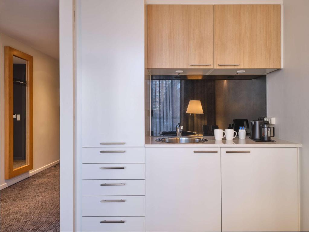 Kuchyň nebo kuchyňský kout v ubytování Adina Apartment Hotel Copenhagen