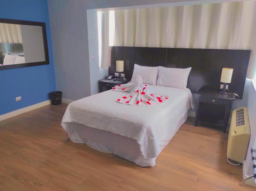 Cama o camas de una habitación en Rio Boutique Hotel