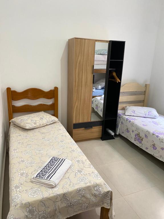 Postel nebo postele na pokoji v ubytování Aconchego! Sua casa com Piscina em Passos!!