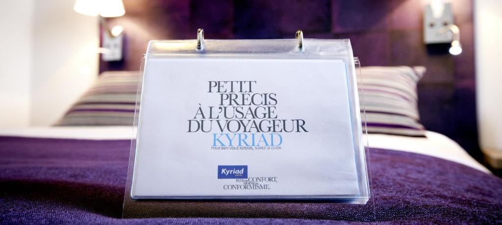 Postel nebo postele na pokoji v ubytování Kyriad Valence Nord Bourg-Les-Valence