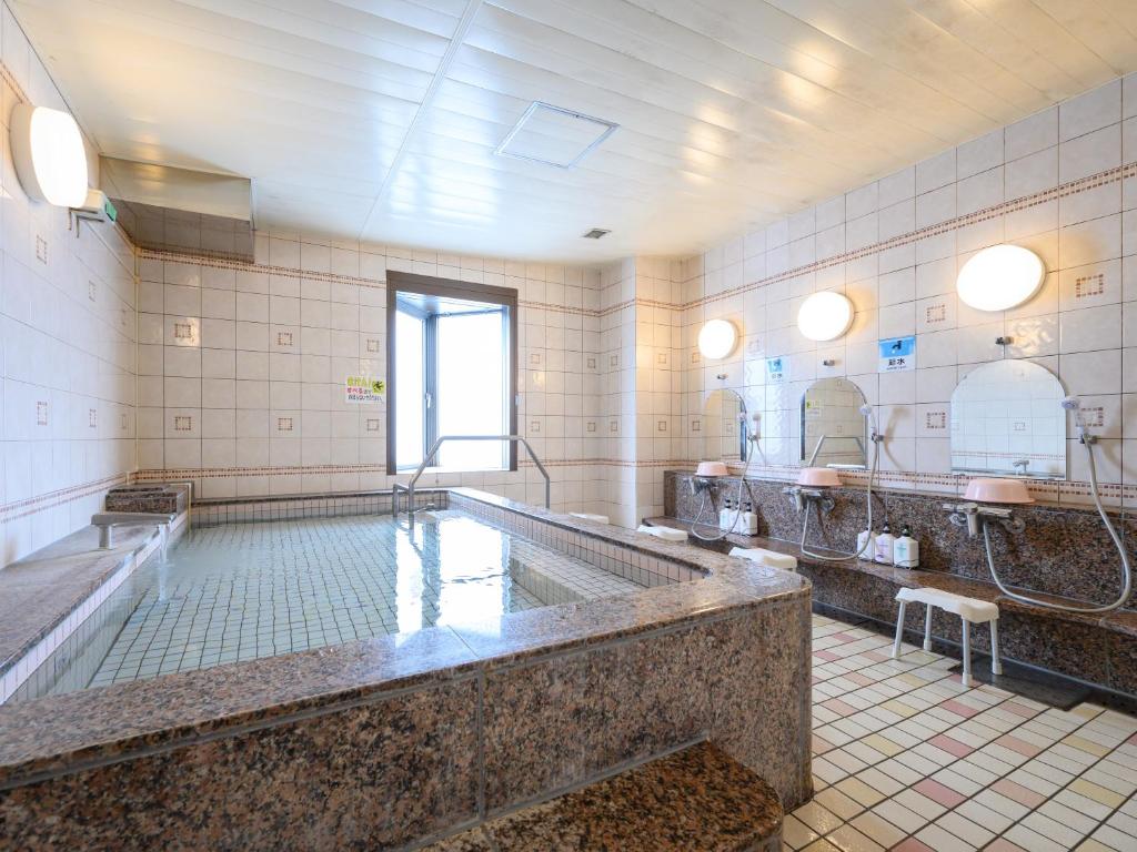 Fotografie z fotogalerie ubytování Rest Inn Taga v destinaci Taga