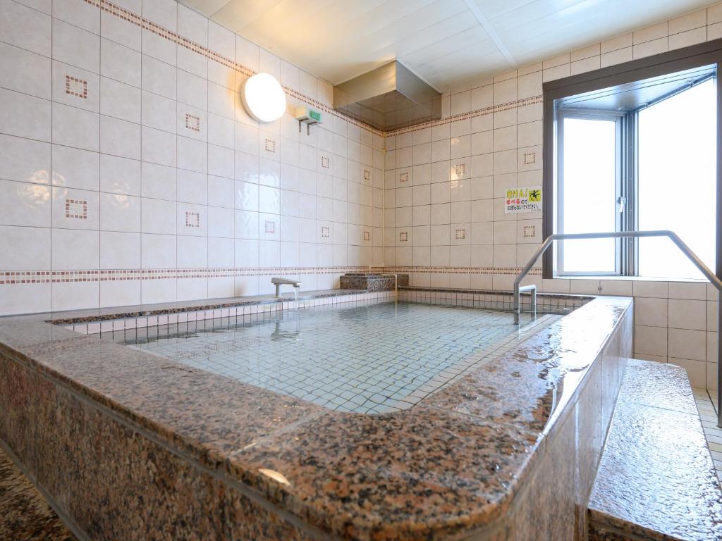 Fotografie z fotogalerie ubytování Rest Inn Taga v destinaci Taga