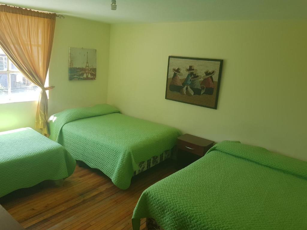 Postel nebo postele na pokoji v ubytování Petite Maison