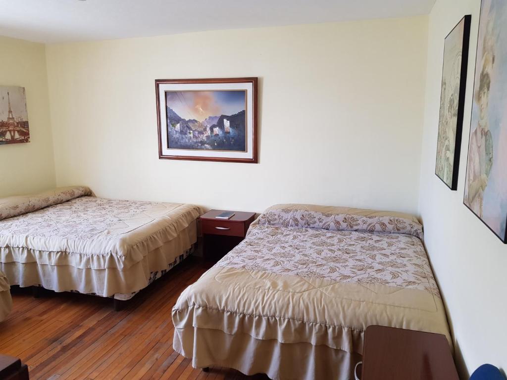Postel nebo postele na pokoji v ubytování Petite Maison