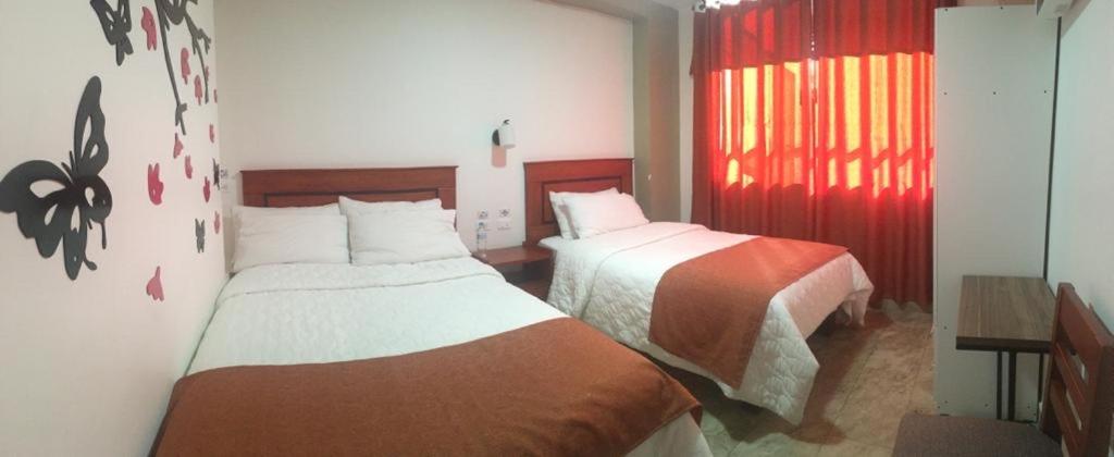 Postel nebo postele na pokoji v ubytování Hotel Seny