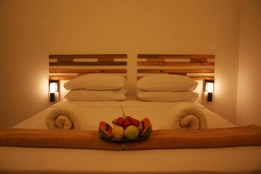 Postel nebo postele na pokoji v ubytování Relax Residence Thoddoo Maldives