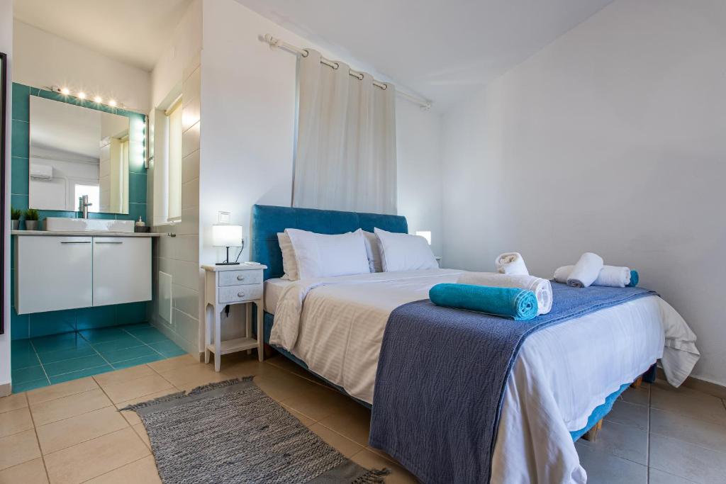 Postel nebo postele na pokoji v ubytování Villa PENELOPE