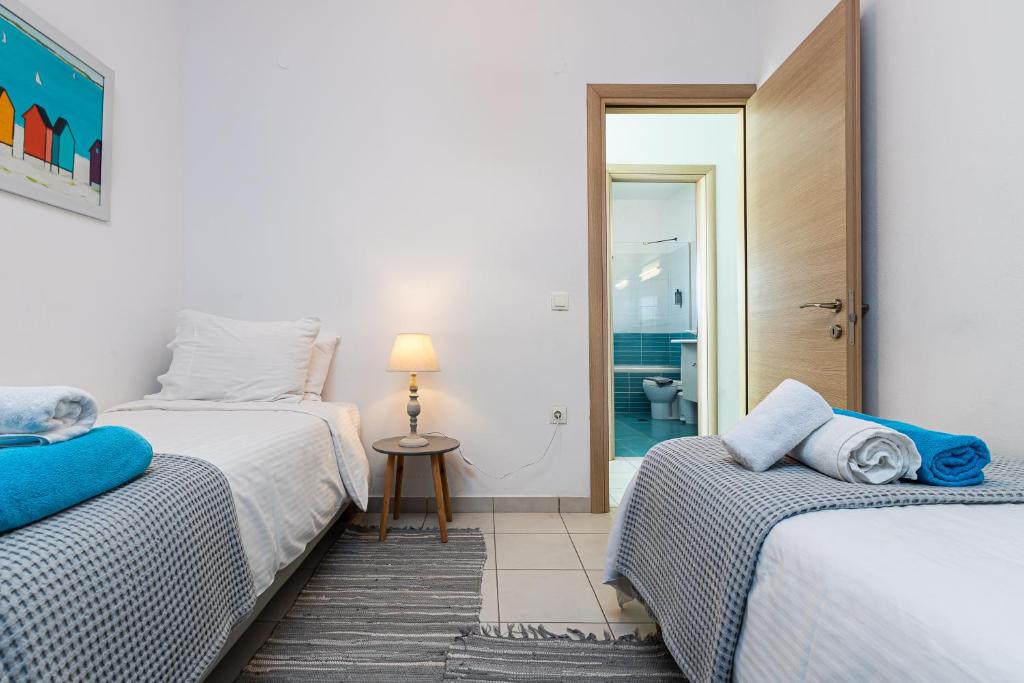 Postel nebo postele na pokoji v ubytování Villa PENELOPE