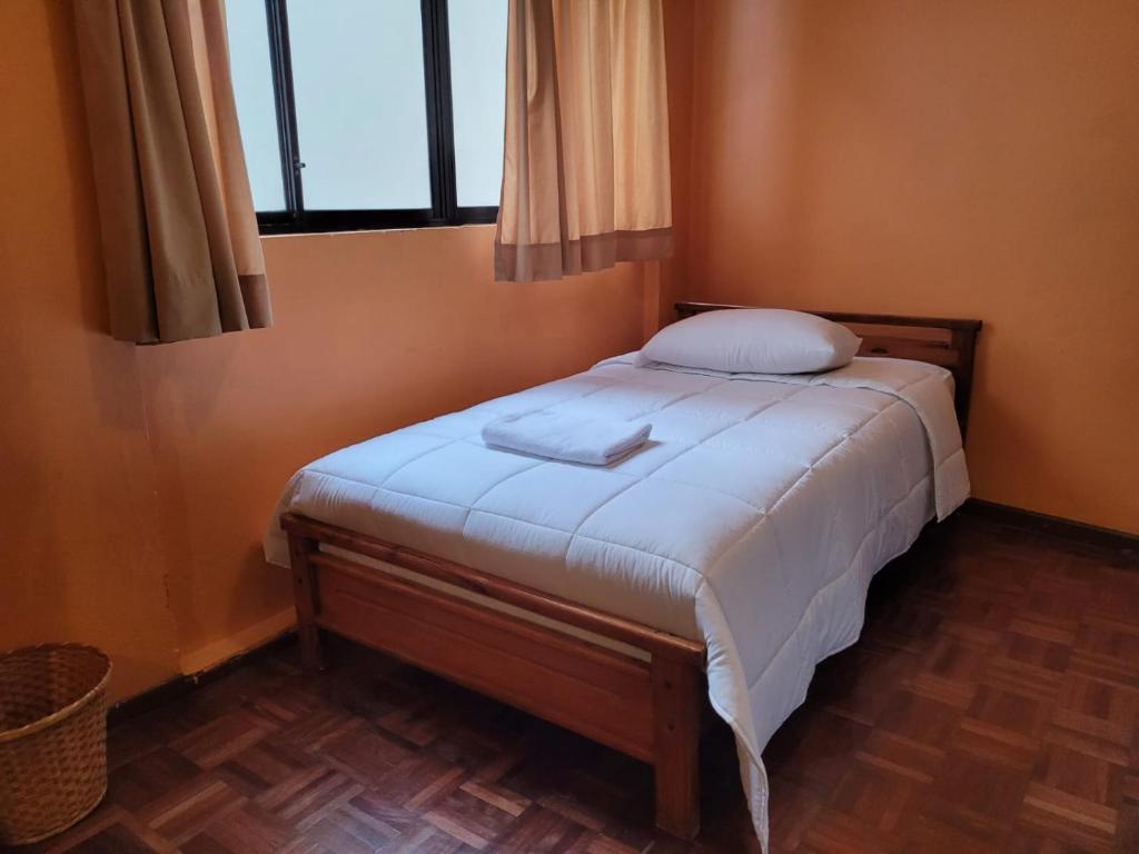 Postel nebo postele na pokoji v ubytování Casa Colon Quito Bed & Breakfast Hostel