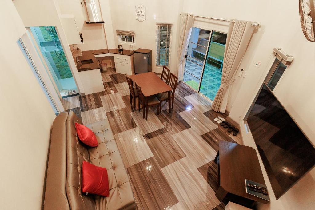 Posezení v ubytování บ้านกันเอง Baan Kun Aeng Homestay