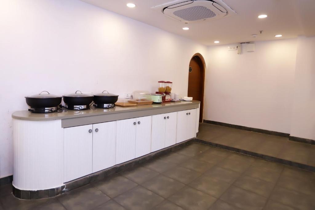 Kuchyň nebo kuchyňský kout v ubytování PK Boutique Hotel