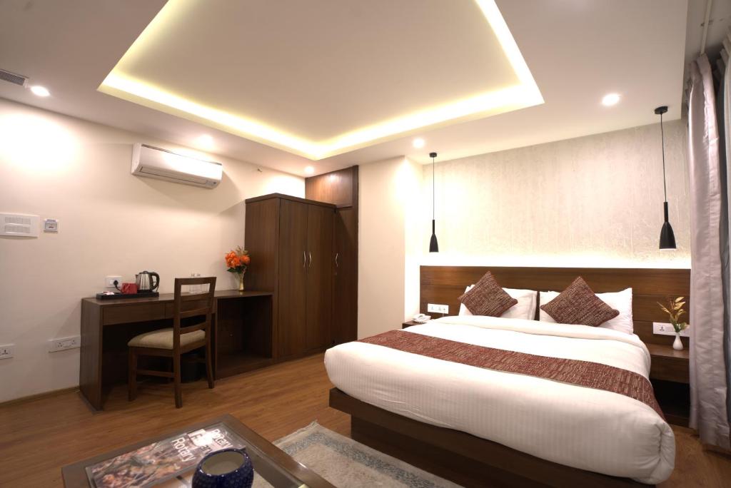 Apex Business Hotel - Tribhuvan International Airport, Kathmandu 객실 침대
