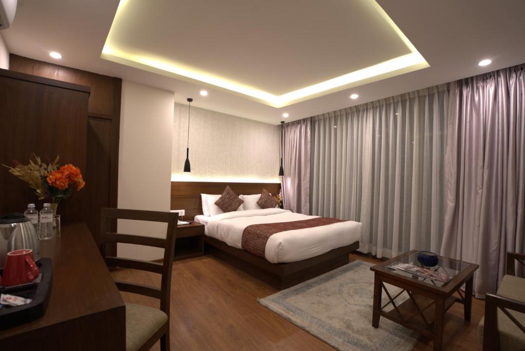 Apex Business Hotel - Tribhuvan International Airport, Kathmandu 객실 침대