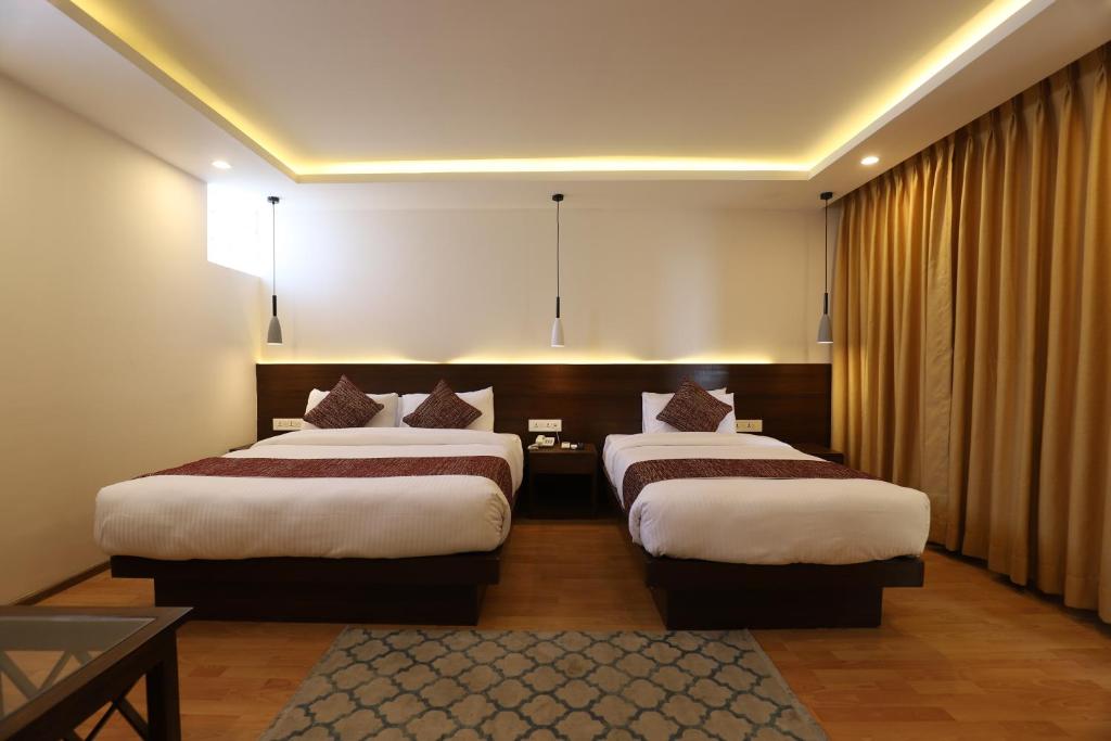 Apex Business Hotel - Tribhuvan International Airport, Kathmandu 객실 침대