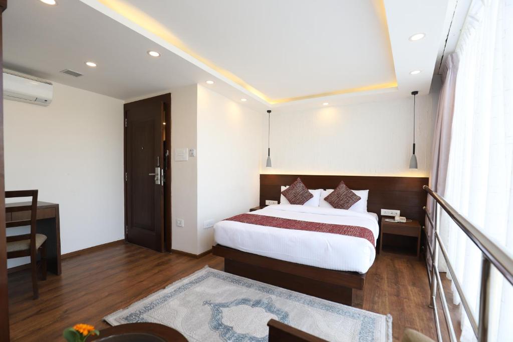 Apex Business Hotel - Tribhuvan International Airport, Kathmandu 객실 침대