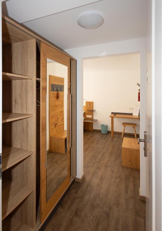 Postel nebo postele na pokoji v ubytování isarwinkel