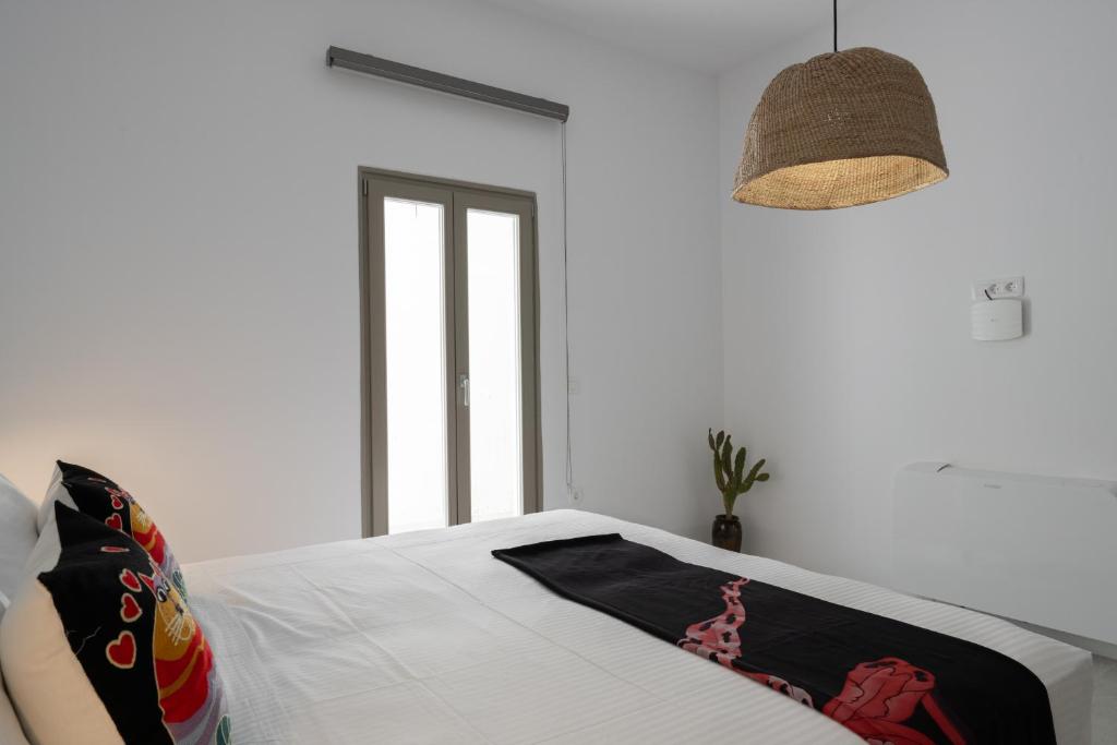 Postel nebo postele na pokoji v ubytování Rizes Villas Santorini with private pool