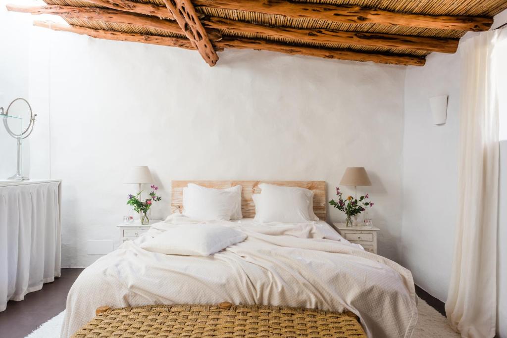 Posteľ alebo postele v izbe v ubytovaní Can Quince Balafia Ibiza Hotel - Turismo de Interior