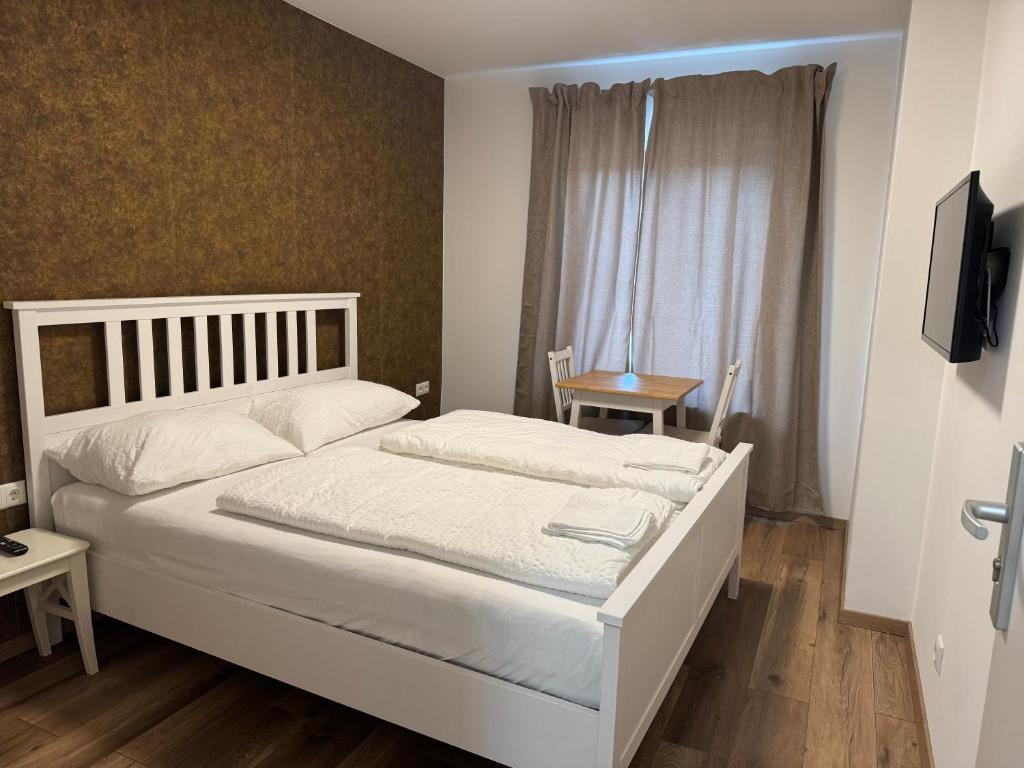 Postel nebo postele na pokoji v ubytování PENSION AMEDY