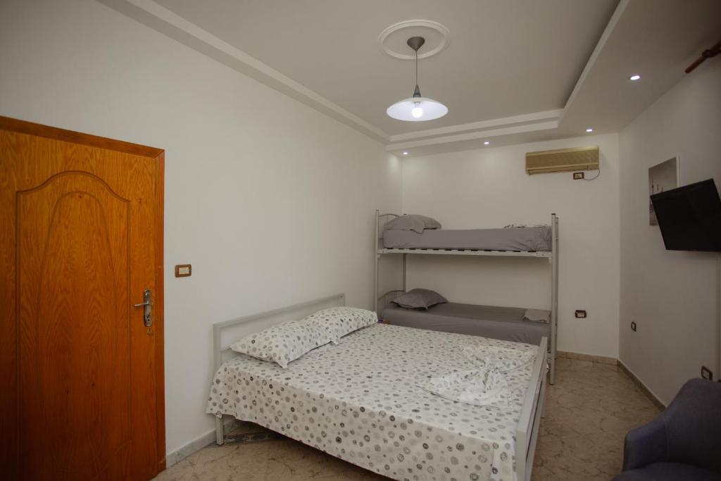 Letto o letti in una camera di Hotel Shkodra Lake