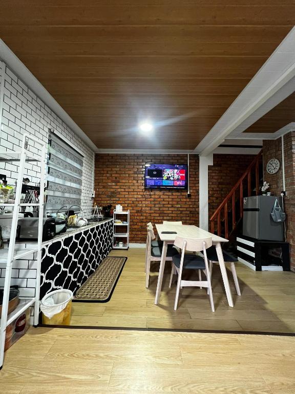 TV a/nebo společenská místnost v ubytování D'Maro Hut Mesilou