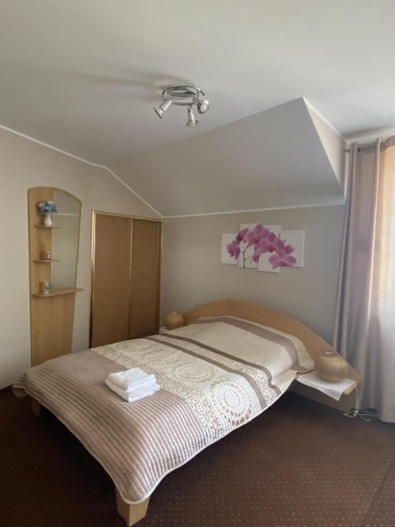 Posteľ alebo postele v izbe v ubytovaní Motel Orion