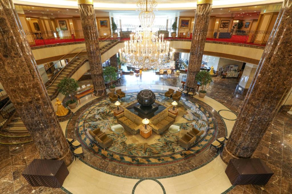 an overhead view of a hotel lobby with a chandelier at Imabari Kokusai Hotel in Imabari