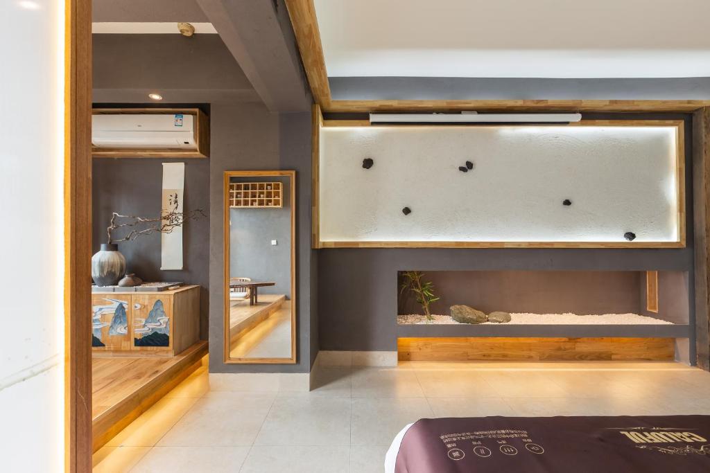 Fotografie z fotogalerie ubytování 重庆解放碑阳崽民宿高层新中式景观Youngzai Apt in Jiefangbei 5 v destinaci Čchung-čching