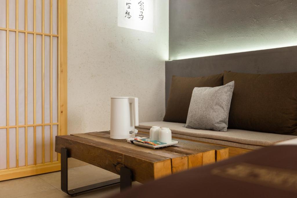 Posezení v ubytování 重庆解放碑阳崽民宿高层新中式景观Youngzai Apt in Jiefangbei 5