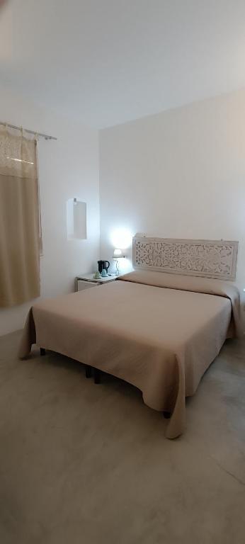 Letto o letti in una camera di B&B Sperlonga