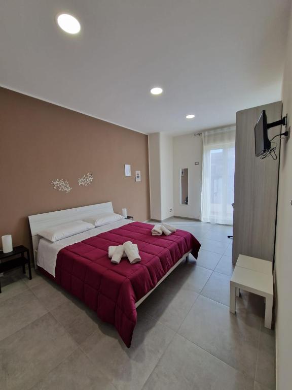Postel nebo postele na pokoji v ubytování B&B Sei Palme