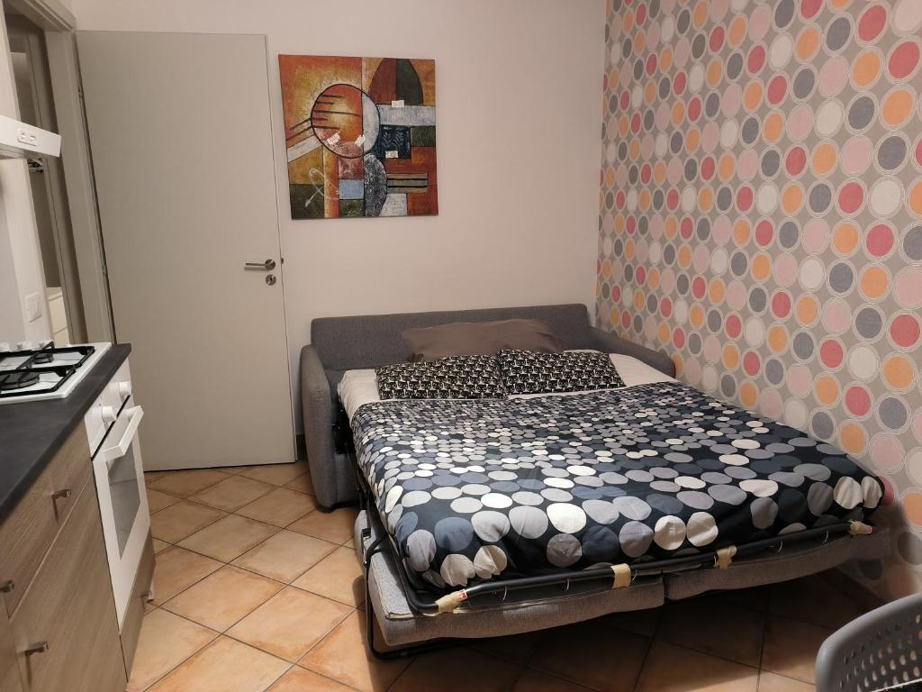 Łóżko lub łóżka w pokoju w obiekcie Etna Holidays Home SereLeo
