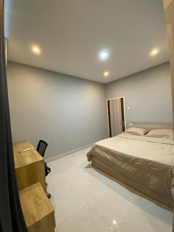 Postel nebo postele na pokoji v ubytování Sukha homestay