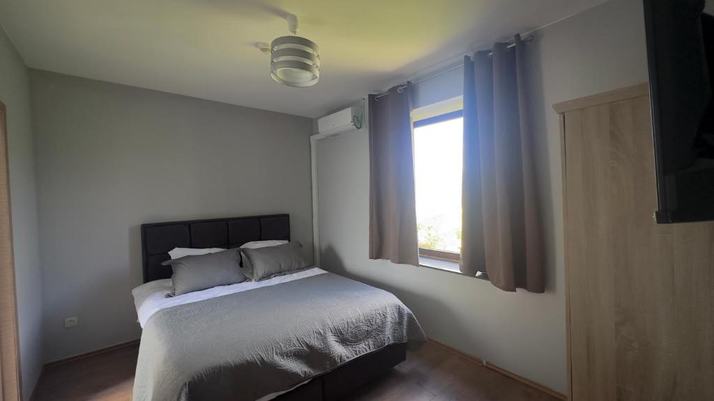 Postel nebo postele na pokoji v ubytování Hôtel Séjour D'Ardenne
