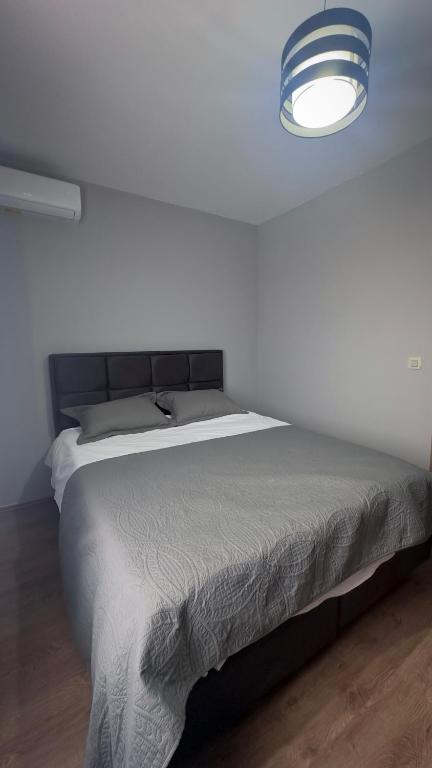 Postel nebo postele na pokoji v ubytování Hôtel Séjour D'Ardenne