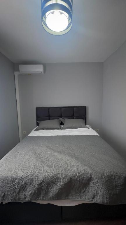 Postel nebo postele na pokoji v ubytování Hôtel Séjour D'Ardenne