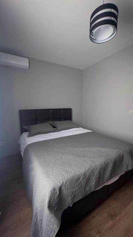 Postel nebo postele na pokoji v ubytování Hôtel Séjour D'Ardenne